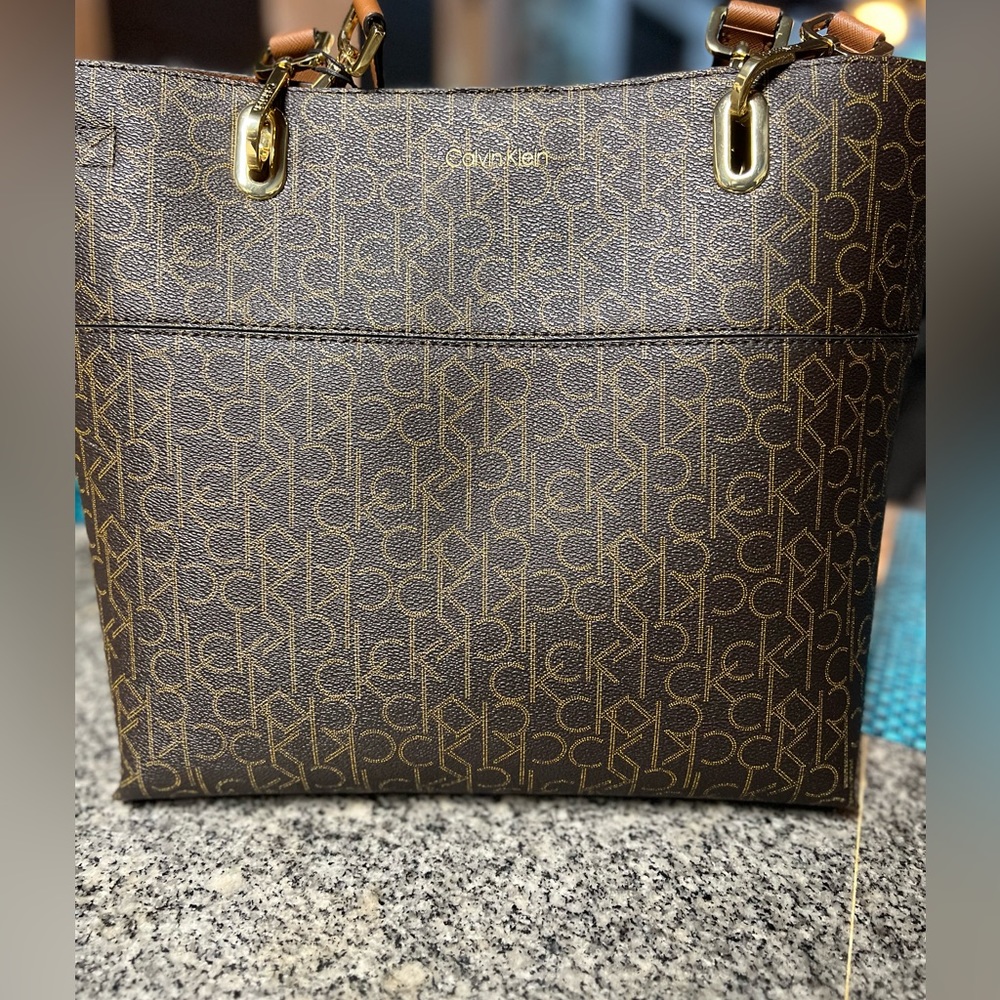 ‼️NEW‼️ Calvin Klein monogrammed purse. Never used.
